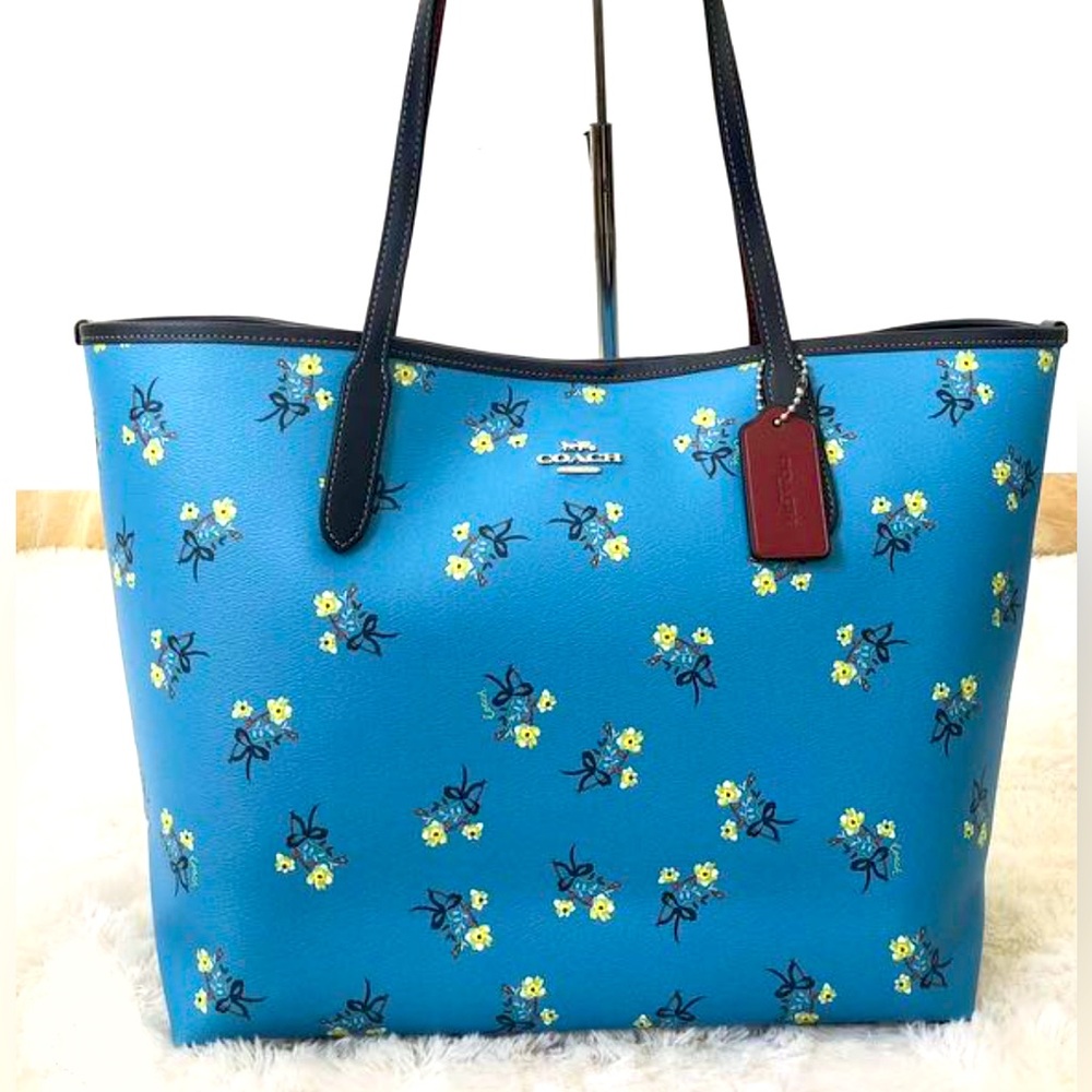 Lightly used Coach City Tote with Floral Bow Print Blue Multi C7273 (fairly new)